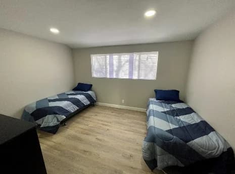 Furnished shared bedroom at New Horizon Opportunities